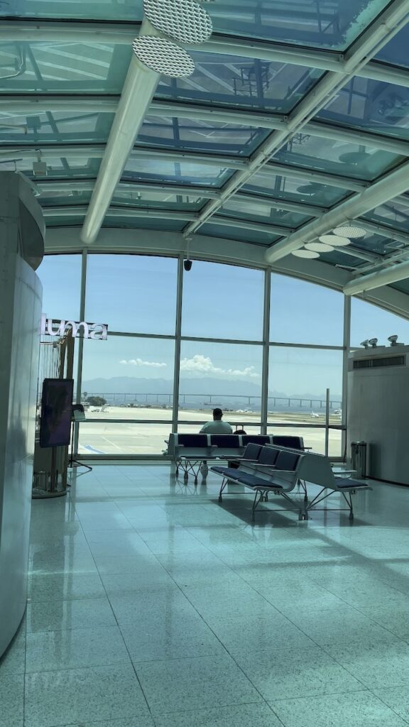 Seating and runway views inside Santos Dumont airport in Rio de Janeiro